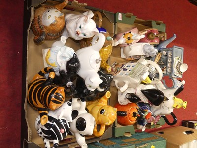 Lot 168 - A collection of novelty teapots, to include an...