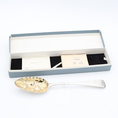 Lot 263 - A George III silver berry spoon, the terminal...
