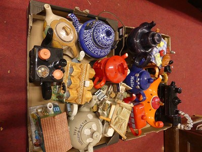 Lot 172 - A collection of novelty teapots, to include an...