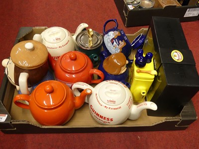 Lot 184 - A collection of novelty teapots, to include a...