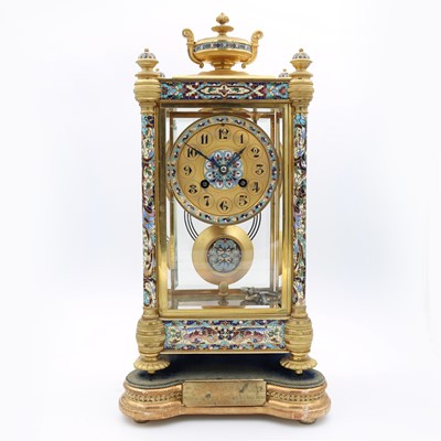 Lot 202 - A late Victorian gilt brass and champleve...