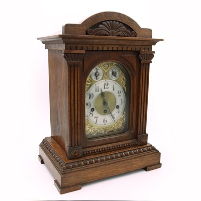 Lot 204 - A late 19th century German oak cased mantel...
