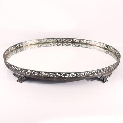 Lot 101 - A George III silver mounted tray, the mirror...