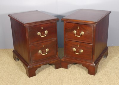 Lot 249 - A pair of mahogany two-drawer bedside...