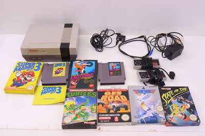 Lot 293 - A Nintendo Entertainment System NES set,...