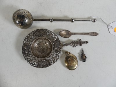 Lot 289 - A 19th century French silver tea strainer,...