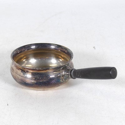 Lot 269 - A white metal brandy pan, of circular form...
