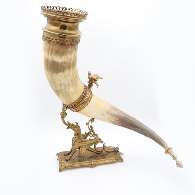 Lot 4 - A gilt brass and horn cornucopia vase, the...