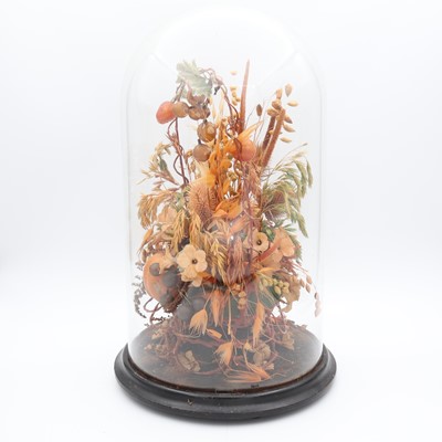 Lot 8 - A dried flower and fruit display, under glass...
