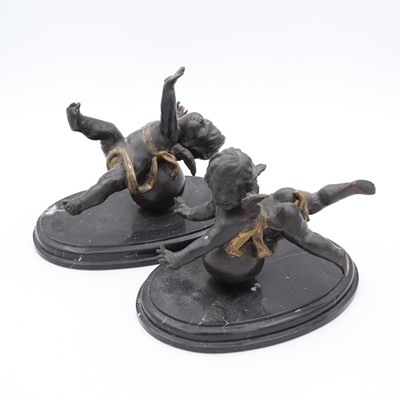Lot 15 - A pair of reproduction bronze parcel-gilt...