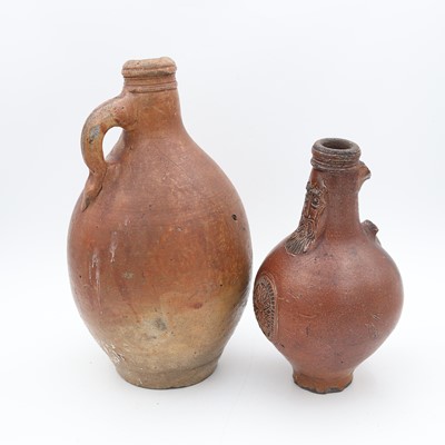 Lot 24 - A German salt-glazed stoneware bellarmine,...
