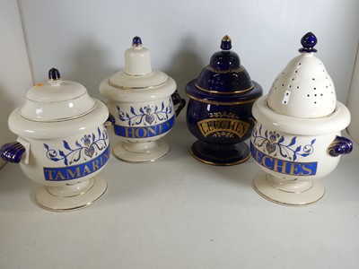 Lot 41 - A group of four reproduction pottery chemist's...