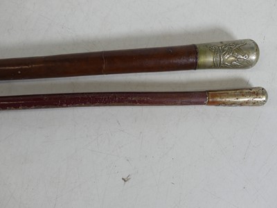 Lot 42 - A military riding crop, the metal pommel...