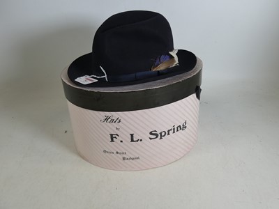 Lot 50 - A lady's navy felt fedora, by Lock & Co,...