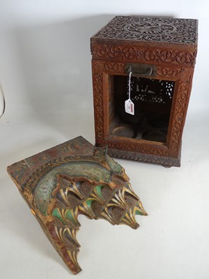Lot 54 - A 19th century Burmese carved teak tantalus...