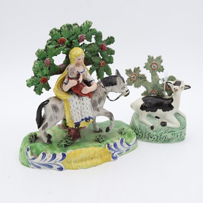 Lot 120 - A 19th century Staffordshire figure depicting...