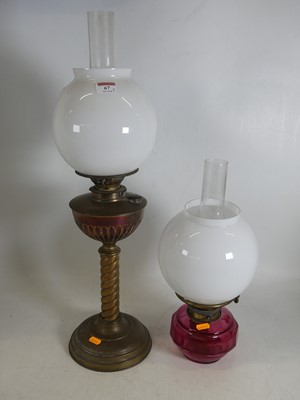 Lot 67 - A late 19th century brass oil lamp, having a...