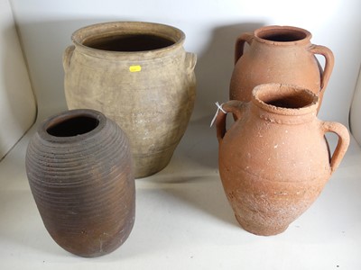 Lot 68 - A terracotta twin-handled olive jar, h.38.5cm,...