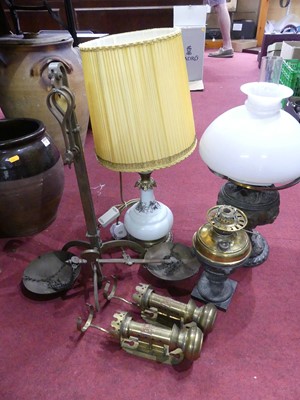 Lot 81 - A collection of lamps, to include a French...
