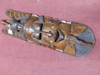 Lot 84 - A tribal carved hardwood mask, h.75cm