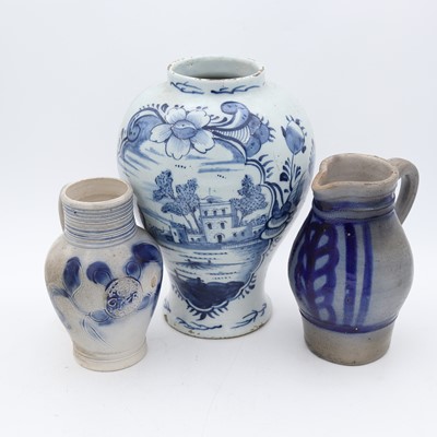 Lot 131 - An 18th century pottery jug, of bulbous form,...