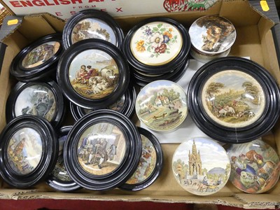 Lot 136 - A collection of Prattware pot lids, 19th...