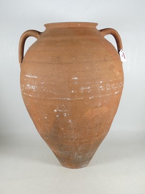 Lot 86 - A terracotta twin-handled urn, h.60cm
