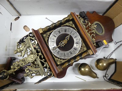 Lot 168 - A reproduction mahogany cased wall clock in...