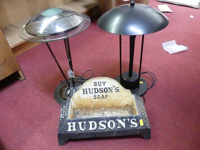 Lot 198 - A contemporary polished metal and glass table...