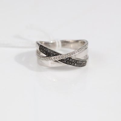 Lot 327 - A modern silver, black and white diamond point-...