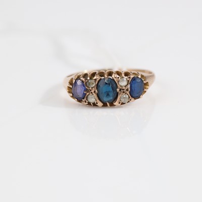Lot 342 - A George V 9ct gold blue and white sapphire...