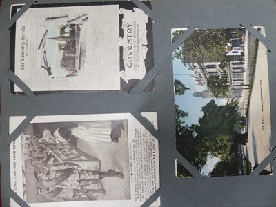 Lot 255 - An early 20th century postcard album, contents...