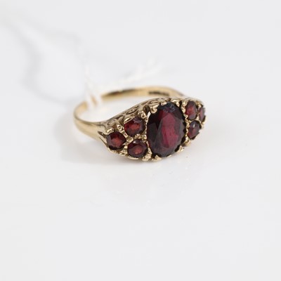 Lot 386 - An Edwardian style 9ct gold multi-garnet set...