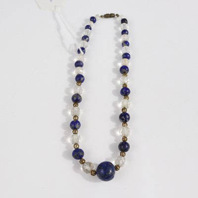 Lot 376 - A gilt metal cut crystal and beaded lapis...