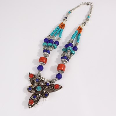Lot 377 - An African style white metal and beaded...