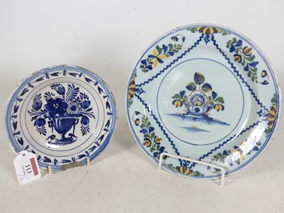 Lot 113 - An 18th century English Delft plate,...